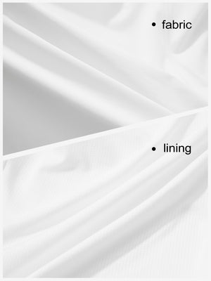 Close-up texture of white high waist built-in short a-line golf skirt with 5 pockets fabric showing weave detail.