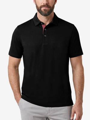 Front upper body shot of model wearing black ultra-comfort slim fit roma knit polo shirts
