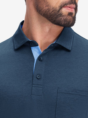 Front view from nose to chest in dark blue heather of performance heather contrast collar polo shirts.