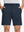 Front lower body shot of model wearing navy flat front flex cotton blend golf shorts