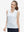 Front upper body shot of model wearing white blue florals women's sleeveless v-neck print golf shirts