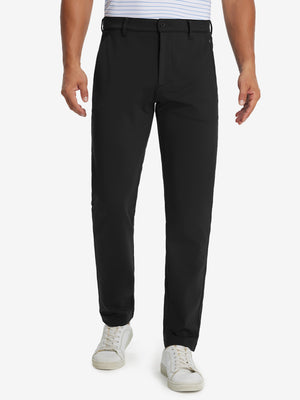Model wearing Golf Lightweight Fleece Lined Dress Pants in black, lower body front view