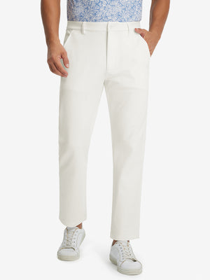 Model wearing Golf Lightweight Fleece Lined Dress Pants in beige, lower body front view