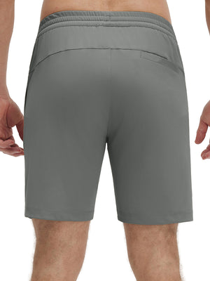 Back lower body shot of model wearing iron grey 4 way stretch breathable workout athletic shorts
