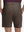 Back lower body shot of model wearing tobacco brown flat front hybrid golf shorts