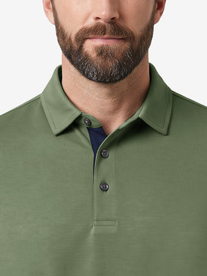 Front view from nose to chest of model wearing green grey ultra-comfort slim fit roma knit polo shirts
