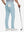 Back lower body shot of model wearing light blue straight fit lightweight dress golf pants
