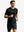 Running front full body view in black of men's short sleeve slim fit roma knit t-shirt.