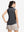 Back upper body shot of model wearing light and dark grey women's q-zip pin striped texture golf shirts