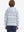 Back upper body view of model wearing youth full print stylish hoodies pullover, christmas snowflake.