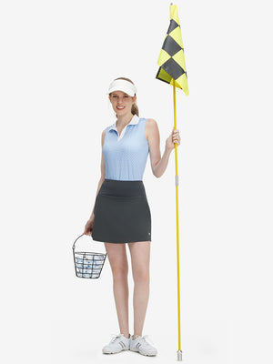 Front full body shot of model exercising in blue plaid women's sleeveless v-neck print golf shirts
