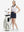 Front full body shot of model exercising in colorful hearts women's sleeveless v-neck print golf shirts
