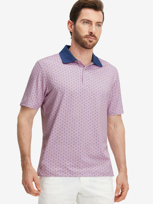Front upper body shot of model wearing pink golf club premium ribbed collar print polo shirts