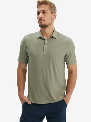 Front half body shot of model wearing birch grey grid performance reflective checked collar golf shirt