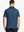 Back half-body view of male model wearing the Blue Everyday Classic Solid Polo