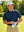 Outdoor front view of model wearing american flag eagle 4 way stretch print collared polo shirts