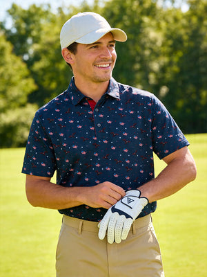Outdoor front view of model wearing american flag eagle 4 way stretch print collared polo shirts