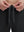 Close-up of elastic waistband on black superion softness mesh joggers with zipper pockets