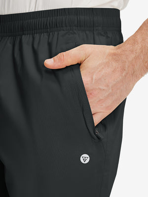 Pantalones Deportivos Ligeros Impermeables con Bolsillos con Cremallera