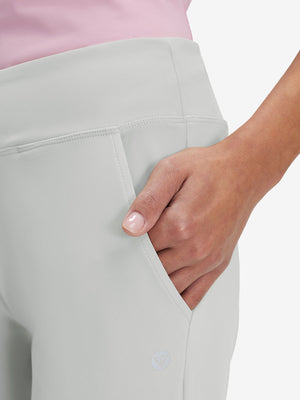 Side view of pocket on silver gray women's high waist stretch golf pants with pockets