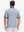 Back upper body shot of model wearing misty blue moisture wicking jacquard golf shirts