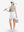 Front full body shot of model exercising in moss green white women's q-zip pin striped texture golf shirts