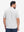 Back half body shot of model wearing light grey white comfy breathable pin-stripe texture golf polos