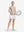 Front full body shot of model exercising in beige white women's q-zip pin striped texture golf shirts