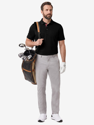Front full body shot of model exercising in black  ultra-comfort slim fit roma knit polo shirts
