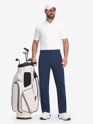 Front full body shot of model wearing white dry fit waffle textured collared golf shirts