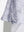 Detail view of hem on pink purple rose women's sleeveless v-neck print golf shirts
