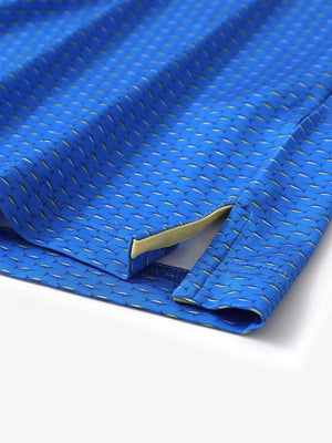 Hem slit detail of MAELREG Performance Jersey Print Polo in Blue Swordfish – comfort & movement