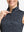 Detail view of neck zipper on black gray blocks women's sleeveless q-zip print quick dry golf tops