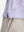 Detail view of hem on lavender rose women's sleeveless v-neck print golf shirts