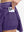 Detail view of inner pocket on dark purple women's moisture-wicking athletic tennis skirts