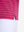Detail view of hem on beetroot purple/charcoal htr non-curl ribbed collar striped polo shirts