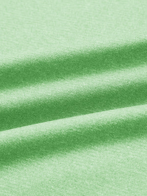 Close-up of classic heather pullover hoodies with 2 pocket fabric in light green melange, soft knit texture