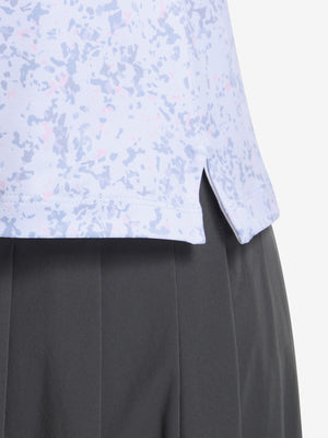 Detail view of hem on pink purple rose women's sleeveless q-zip print quick dry golf tops