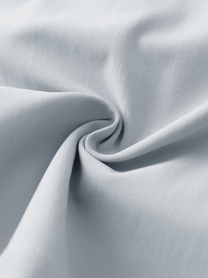 Fabric detail of 4-way stretch performance solid shorts with flexible feel in glacier grey