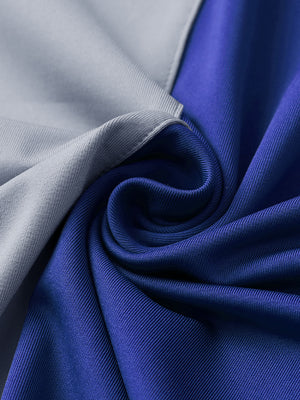 Texture close-up of Moisture wicking color block polo shirts with soft feel and klein blue detail
