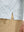 Detail view of hem on dark grey line premium ribbed collar print polo shirts