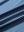 Texture close-up of Kids stripe golf polos with soft fabric and bright blue denim stripe stripes