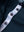 Detail view of collar and buttons on navy women's 5 buttons collared polo shirts