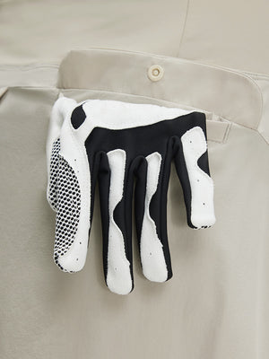 Detail view of pocket on oyster gray women's stretch a-line golf skort with 7 pockets