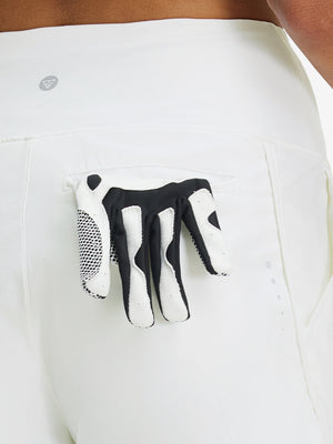 Back side view of pocket on white women's high waist 2 in 1 quick dry shorts with 7 pockets