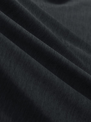  Close-up view of soft heather fabric texture and fine knitting craft, performance heather contrast collar polo shirts in black heather