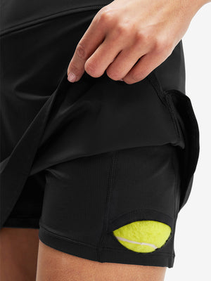 Inside view of pocket on black high waist built-in short a-line golf skirt with 5 pockets