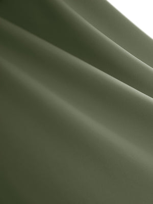 Close-up texture of mossy stone women's high waisted golf skirts with 4 inner pockets fabric showing detailed material and weave.