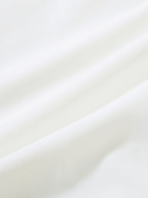 Close-up texture of white women's high waist 2 in 1 quick dry shorts with 7 pockets fabric showing weave detail.