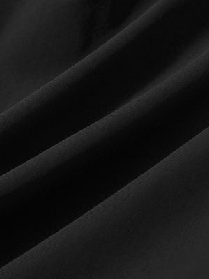 Close-up texture of black women's high waist 2 in 1 quick dry shorts with 7 pockets fabric showing weave detail.